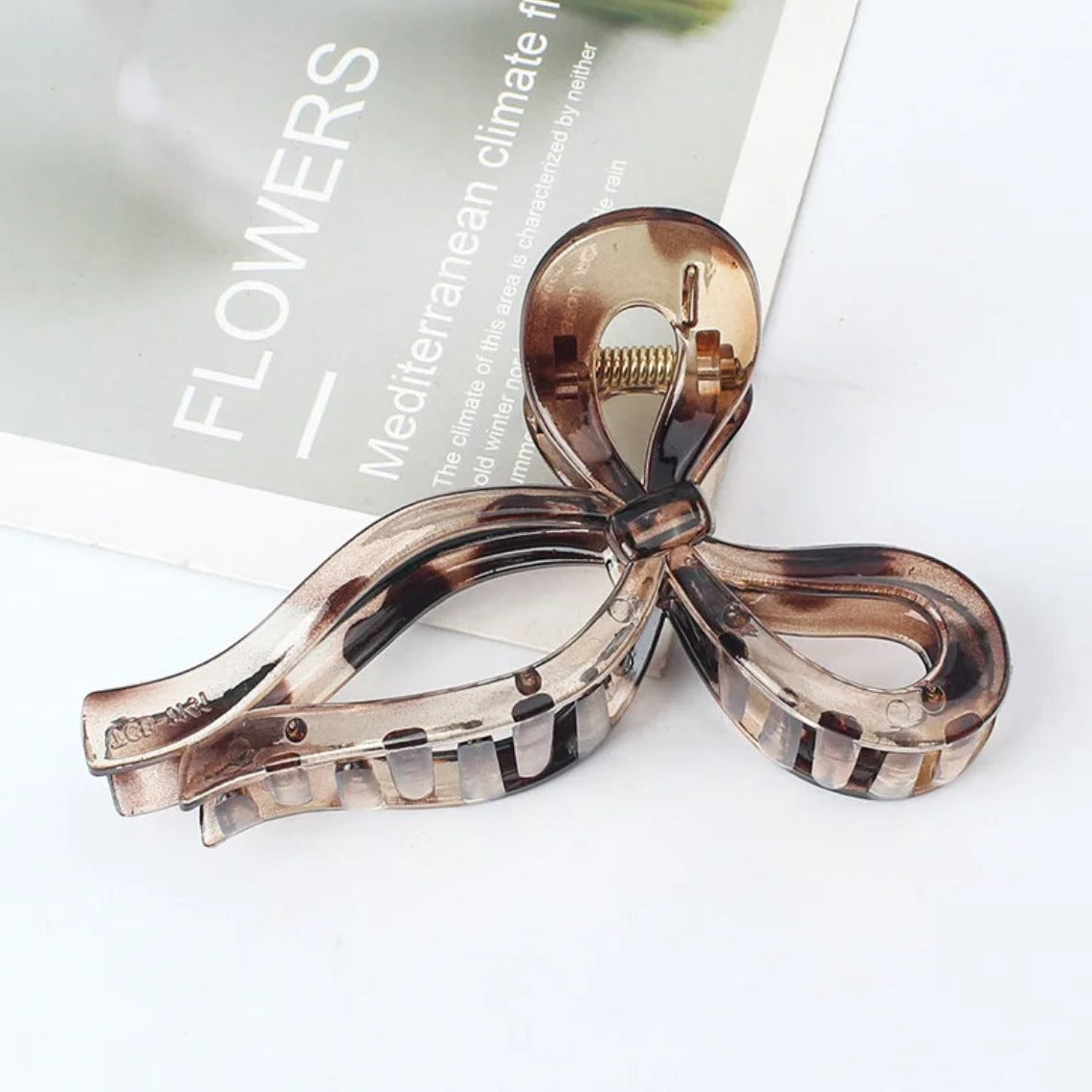 light tortoise bow claw clip